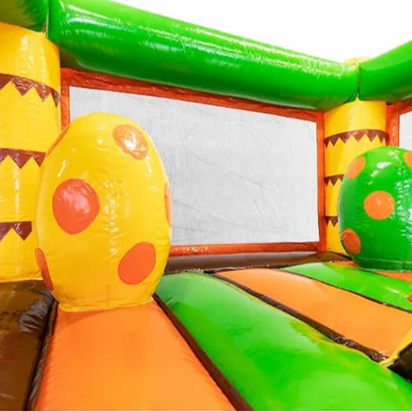 Mini Bounce Dino – speelelementen binnenkant Binnenkant van het Mini Bounce Dino springkussen met twee dinosaurus-eieren